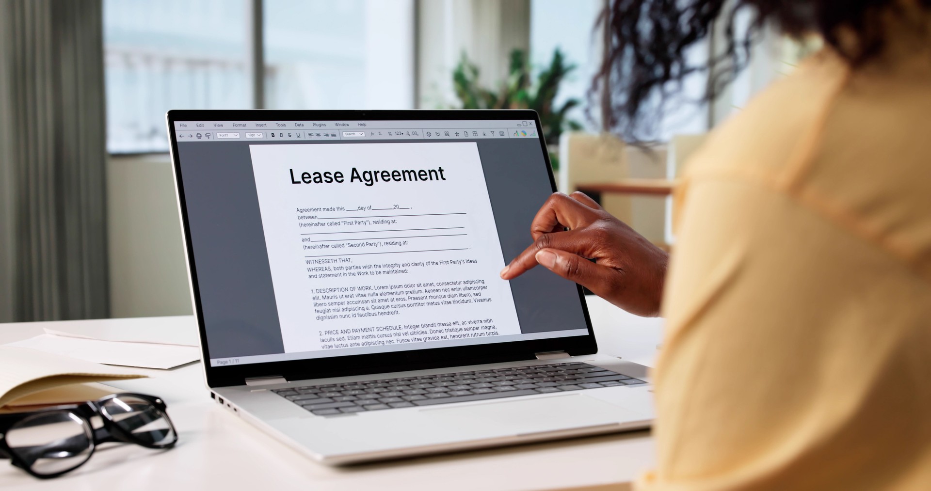 Woman Signing Lease Agreement